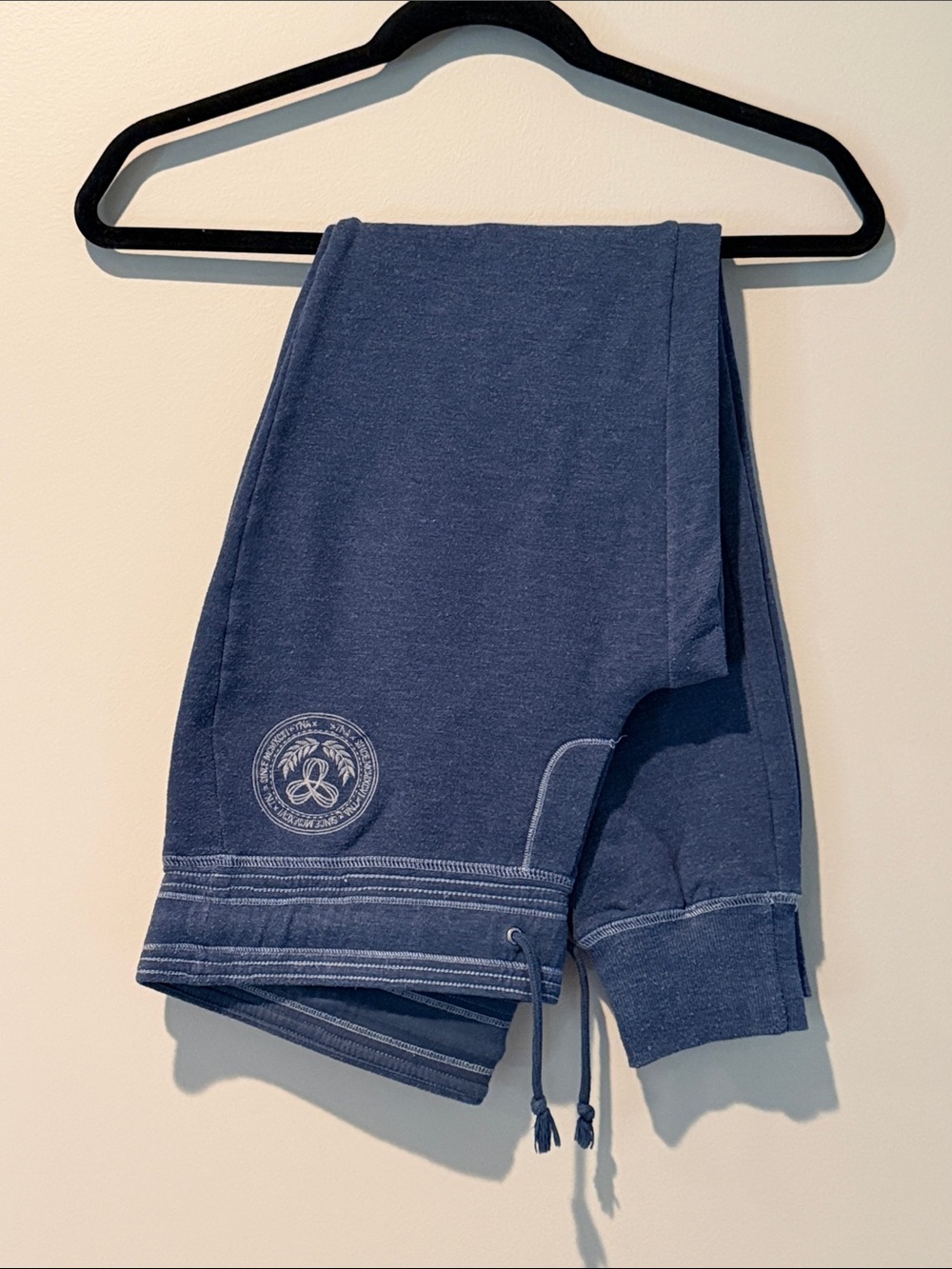 TNA Blue Drawstring Sweatpants with Crest Detail